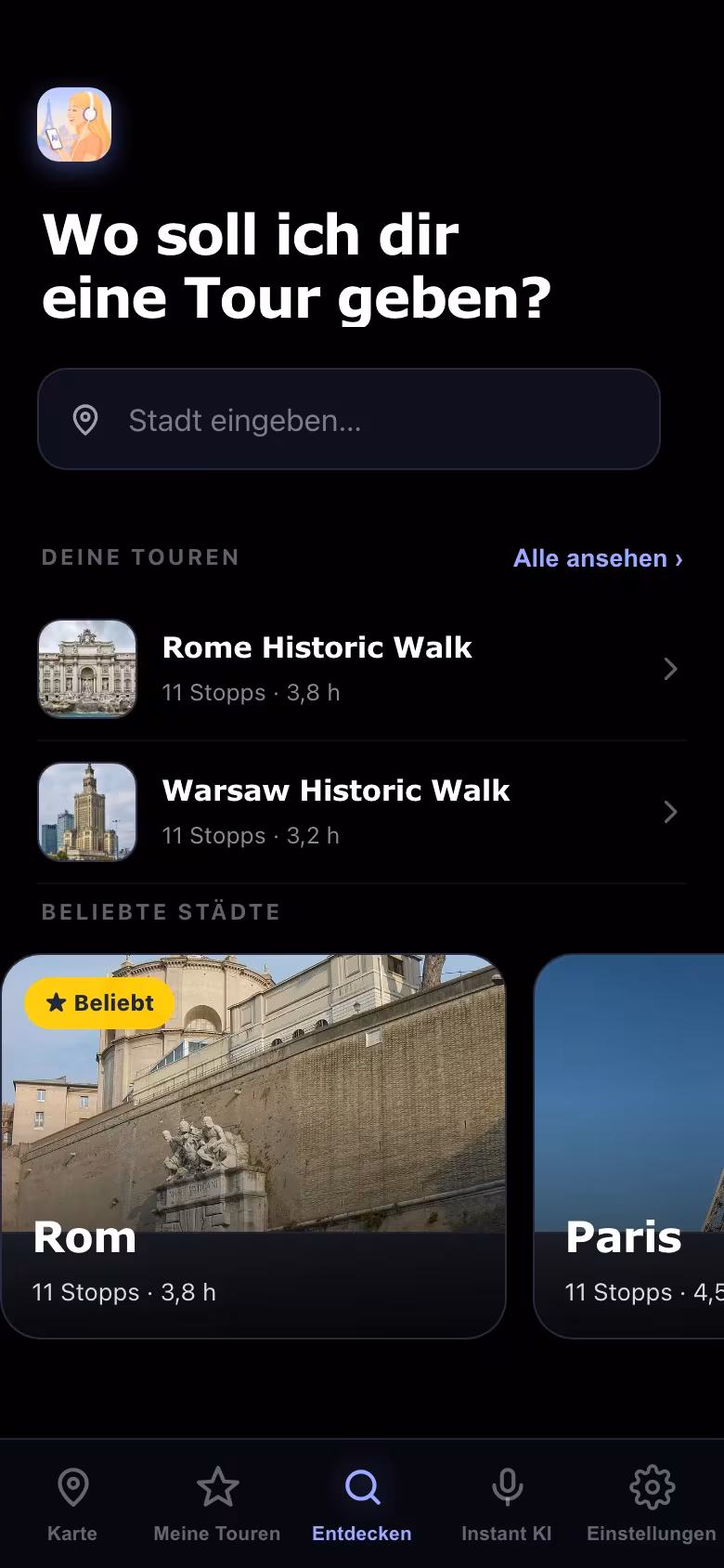 Der Entdecken-Screen der App mit der Frage „Wohin soll ich dich führen?“, einem Suchfeld für Städte und beliebten Zielen wie Rom und Paris.