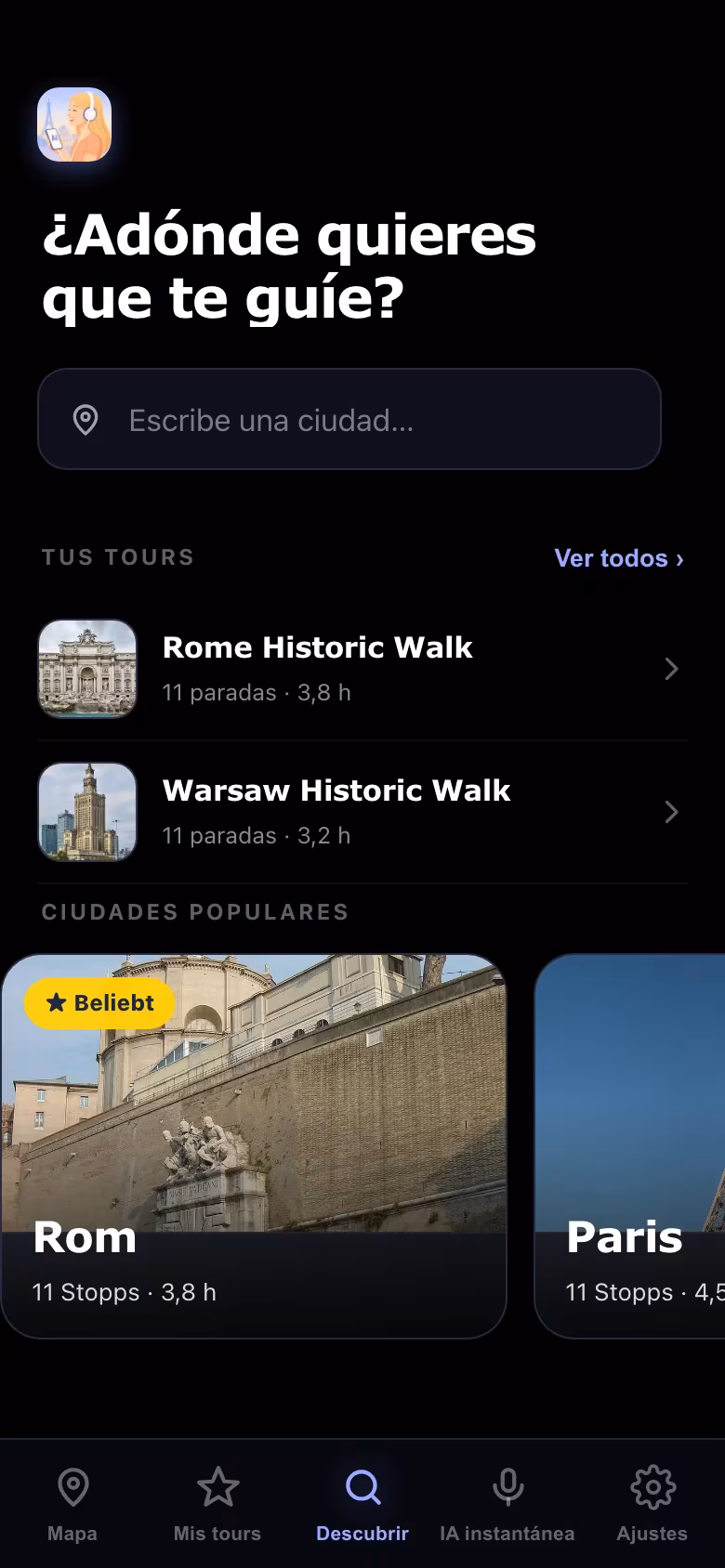 La pantalla Descubre de la aplicación, que pregunta «¿A dónde te guío?» con un buscador de ciudades y ciudades populares como Roma y París.